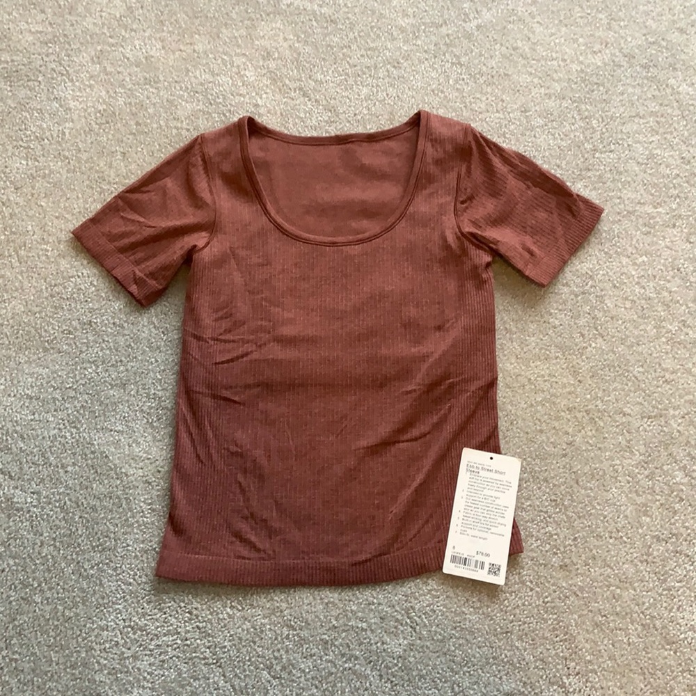Lululemon Ebb to Street Short Sleeve top in ancient copper! Size 8